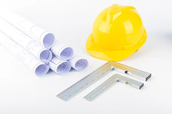 Yellow safety helmet and Scrolls — Stock Photo, Image