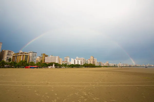 Rainbows appearing in the late afternoon in the city of Santos during the quarantine of Covid-19, Brazil.