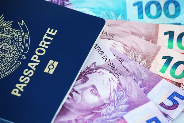 Brazilian passport with bills — Stock Photo, Image