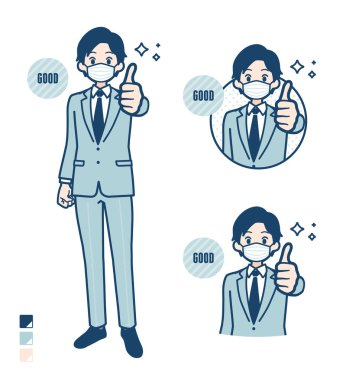 Genç bir işadamı, başparmakları havada bir maske takıyor.