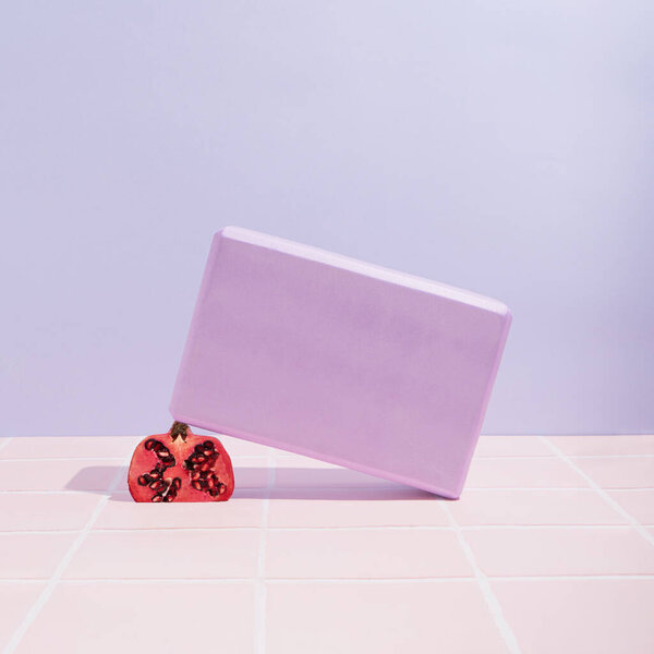 Purple Yoga Block Red Pomegranate Pastel Background Tiles Home Gym Royalty Free Stock Images