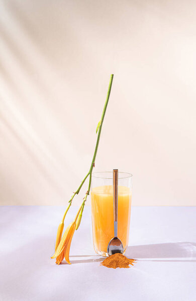 Curcuma Orange Juice Pastel Beige Purple Background Summer Refreshment Drink Stock Picture