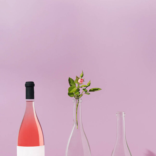Creative Frontal Pattern Made Rose Wine Bottles Pink Roses Pastel Royalty Free Stock Images