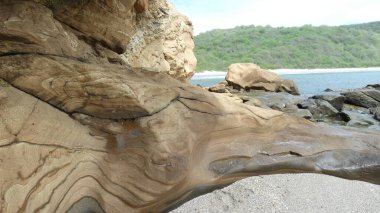 Şaşırtıcı doğal desenler. Sanatçı-Pasifik Okyanusu. Ekvador sahilinde çok güzel bir sahil, beyaz kum ve turkuaz su - de Los Frailes.