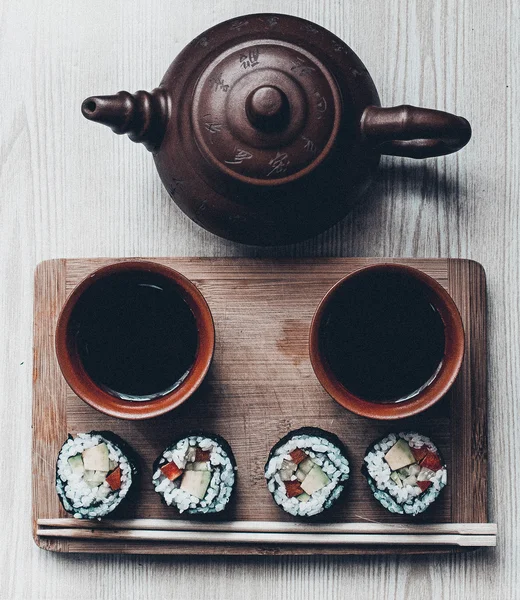 Chá e sushi Fotografia De Stock