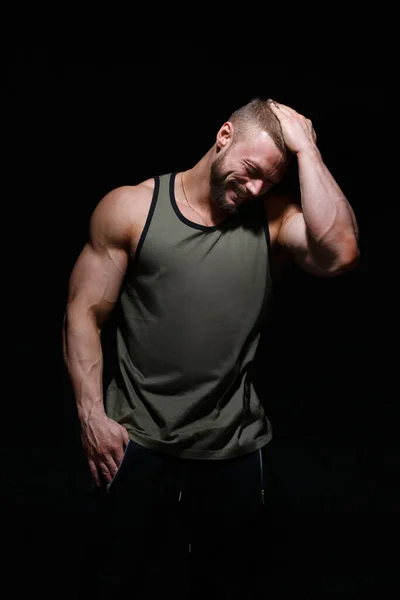 Cute Muscular Athletic Bearded Guy Laughs Embarrassedly Holding His Head — Stock Photo, Image