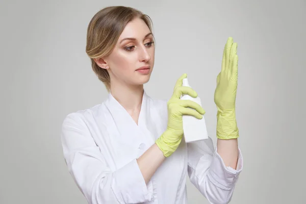 Girl White Medical Coat Wearing Bright Rubber Gloves White Bottle — Stock Photo, Image