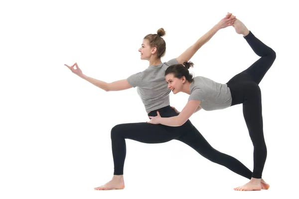 Två Flickor Engagerade Yoga Isolerad Vit Bakgrund — Stockfoto