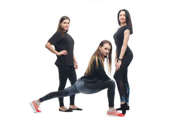 Три Стройные Девушки Спортсменки Изолированы Белом Фоне — стоковое фото