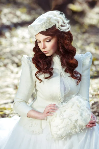 Portrait of a bride in an elegant dress made — Stok fotoğraf