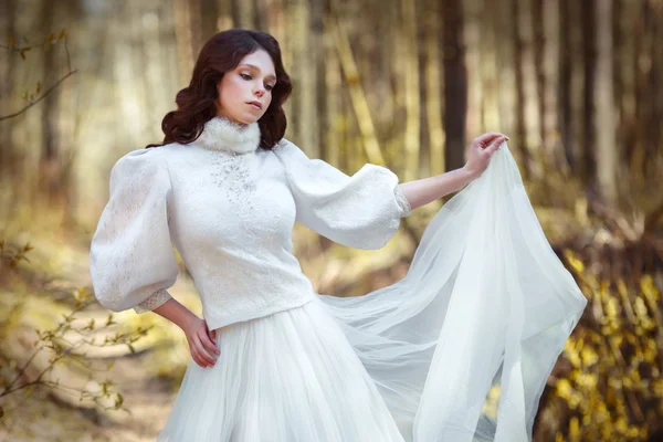 Beautiful girl in a white blouse made of felt — Stok fotoğraf