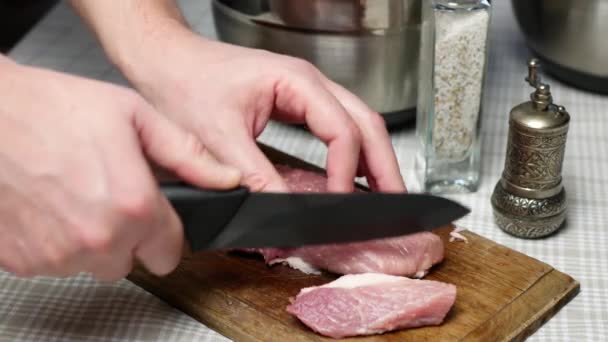 Cutting Meat Slices Black Knife Man Cutting Fresh Raw Pork — Stock Video