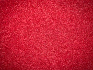Parlak kırmızı kadife kumaş. Kadife yüzey veya arkaplan, kapat
