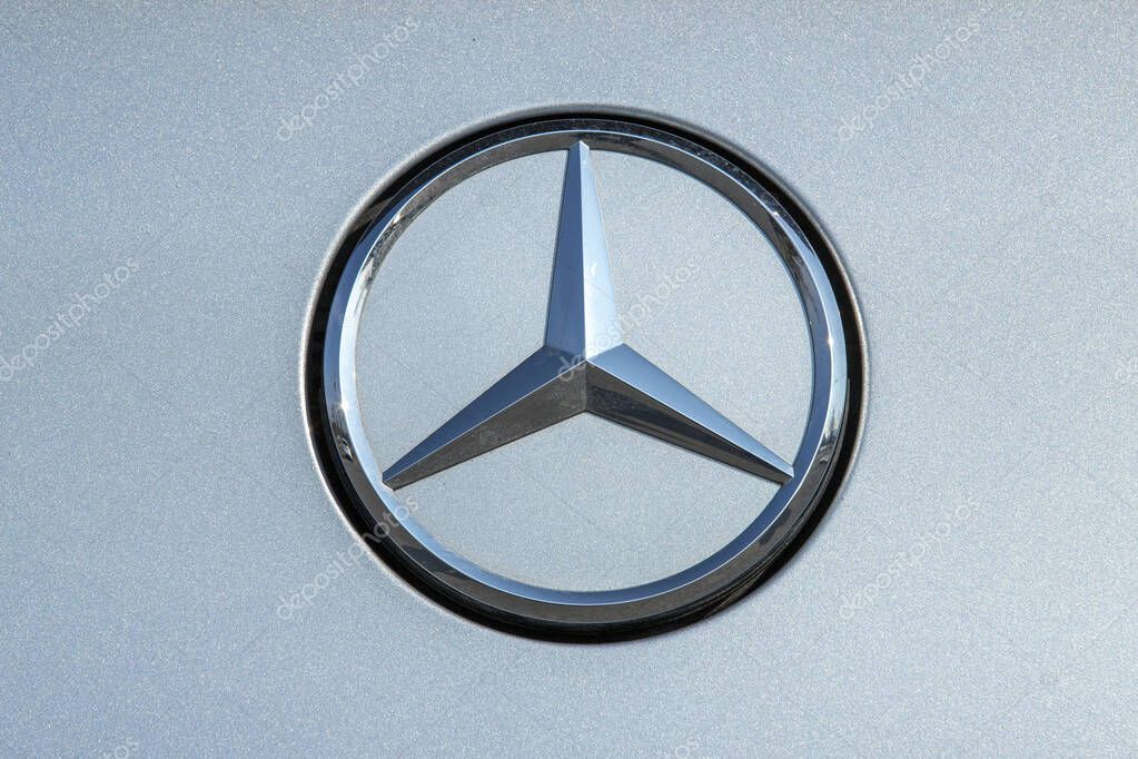 Mercedes logo is on the car