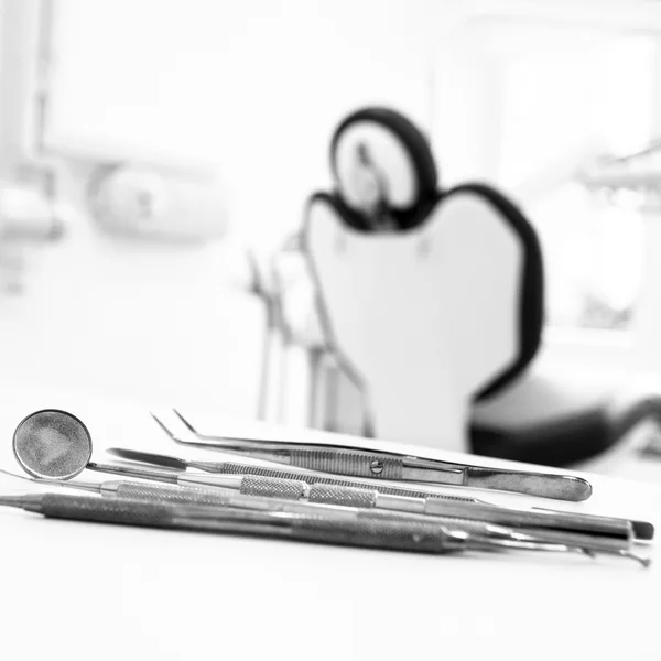 Herramientas dentista fondo de la clínica — Foto de Stock