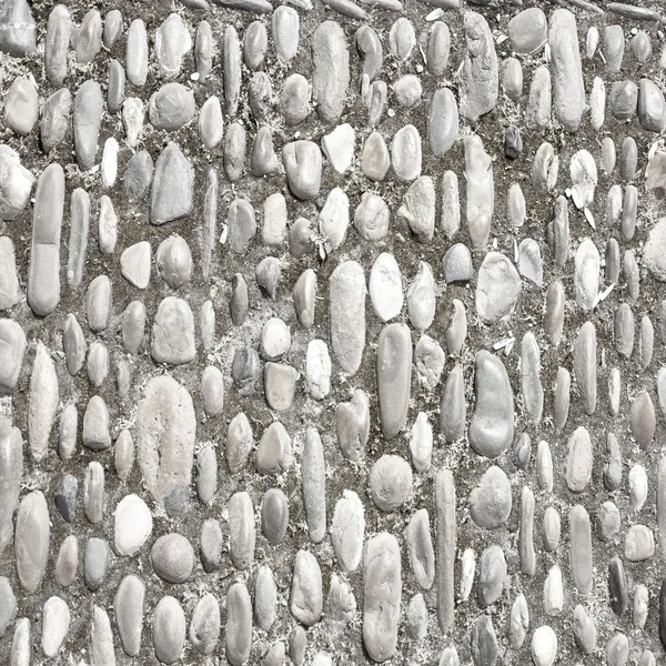Текстура камней или фон — стоковое фото