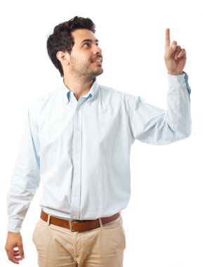 young man pointing up on a white background