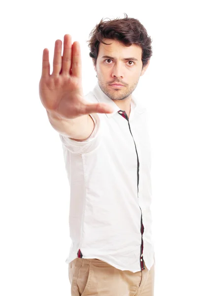 Hombre haciendo gesto de parada sobre un fondo blanco — Foto de Stock