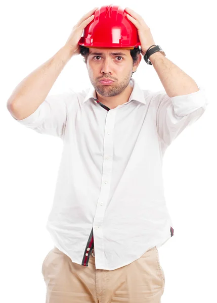 Gritando sorprendido joven con las manos en la cabeza, aislado en un blanco — Foto de Stock