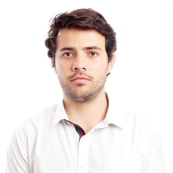 Porträt eines jungen, gut aussehenden hispanischen Mannes mit neutralem Ausdruck — Stockfoto