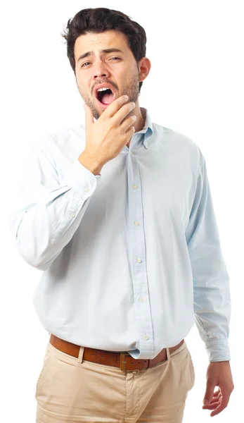 Cansado homem com bocejo gesto sobre um fundo branco — Fotografia de Stock