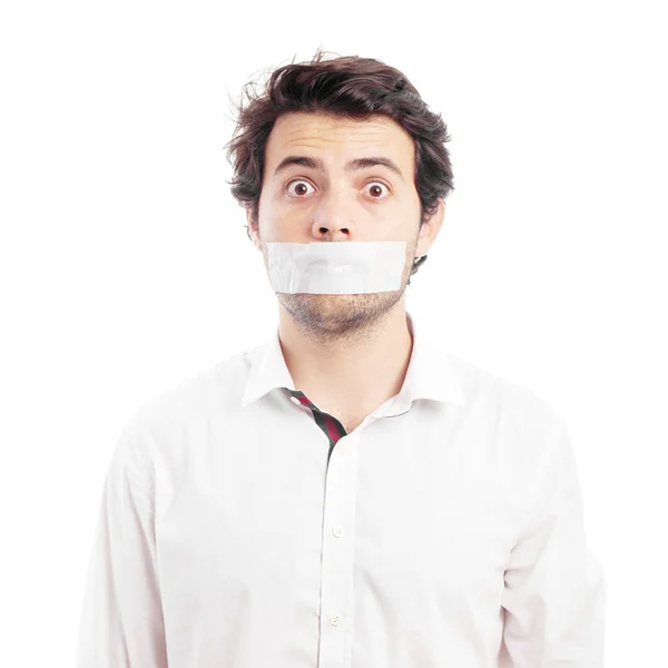 Young man silenced by tape — Stock Photo, Image