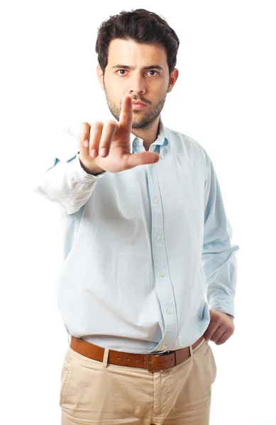 Junger Mann berührt Bildschirm auf weißem Hintergrund — Stockfoto