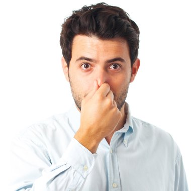 man without smell gesture on a white background