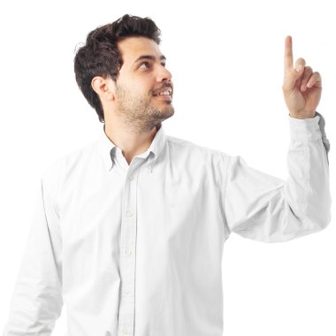 young man pointing up on a white background