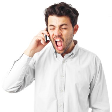 young man shoutting to cellphone on a white background