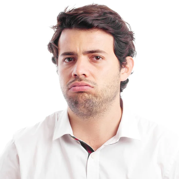 Hombre enojándose sobre un fondo blanco — Foto de Stock