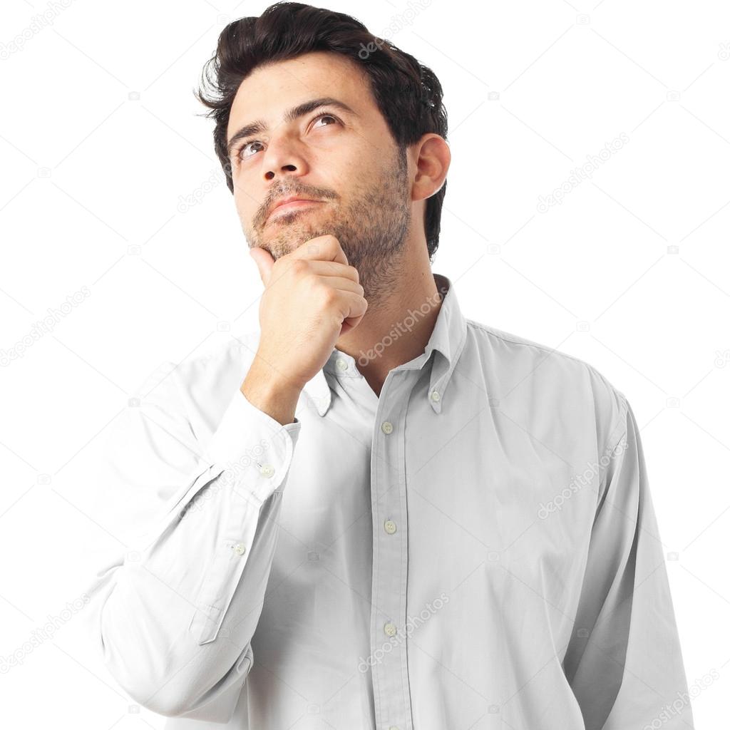 young man thinking on a white background