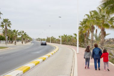walking on street back view