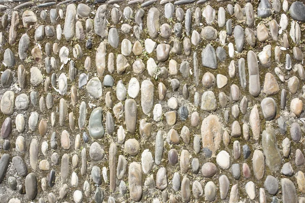 Текстура камней или фон — стоковое фото