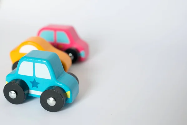 Wooden Toy Cars Yellow Blue Pink Colors White Background — Stock Photo, Image
