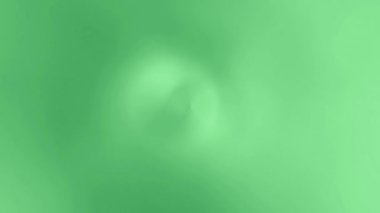 Parlak renkler yavaşça birbirine karışır.