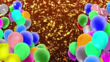 Bir sürü renkli balon rüzgarın gücüyle sallanıyor.