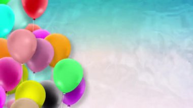 Bir sürü renkli balon rüzgarın gücüyle sallanıyor.