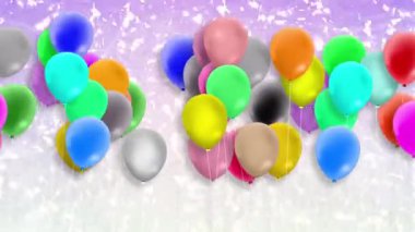 Bir sürü renkli balon rüzgarın gücüyle sallanıyor.