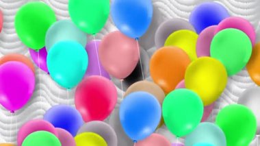 Bir sürü renkli balon rüzgarın gücüyle sallanıyor.