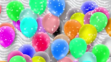 Bir sürü renkli balon rüzgarın gücüyle sallanıyor.