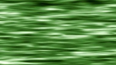 Kıvrımlı dalgalı yüzey sürekli ışığa yansıyor..