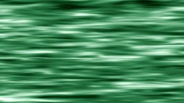 Kıvrımlı dalgalı yüzey sürekli ışığa yansıyor..