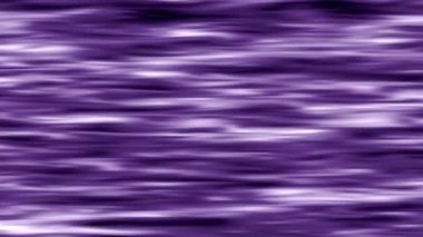 Kıvrımlı dalgalı yüzey sürekli ışığa yansıyor..