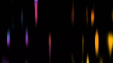 Siyah bir arkaplanda titreşen canlı renkler.