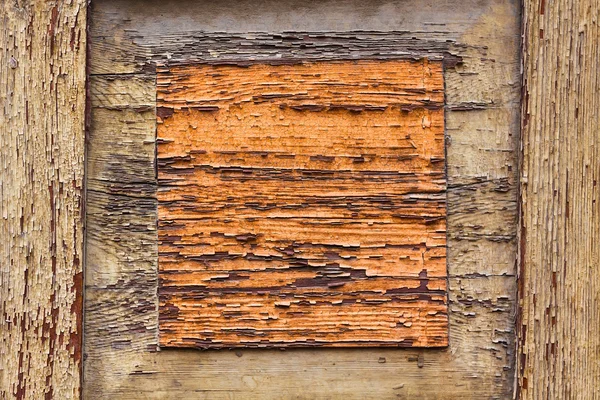 Oranje houten structuur met vierkant in het midden — Stockfoto