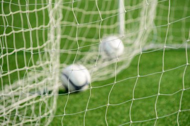 Futbol net arka plan out-focus topları ile