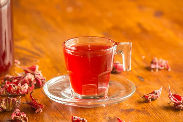 Roselle juice has a sour taste and is boiled with water. Add sugar and a little salt. Drink for good health