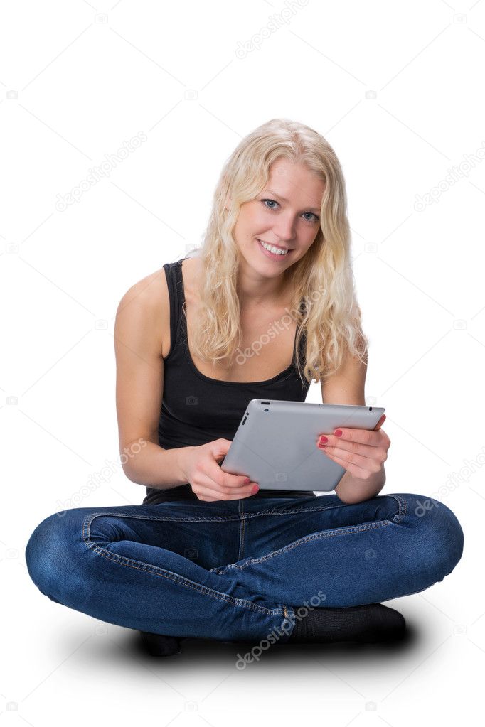 Young blond girl with a tablet