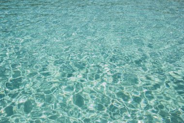 Water reflections on shallow sandy beach bottom clipart